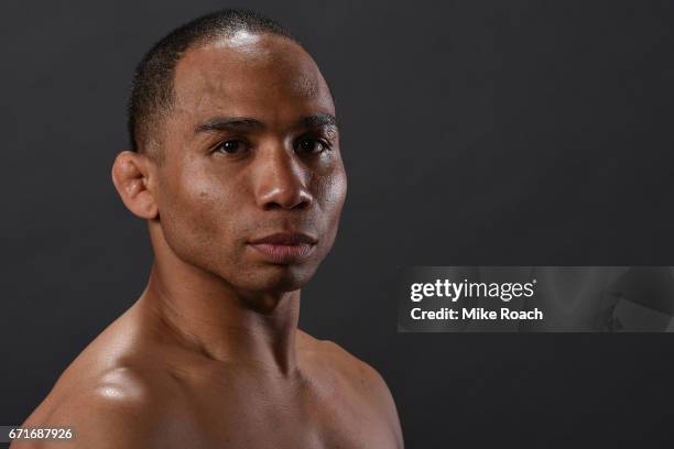 John Dodson poses for a portrait backstage after his victory over Eddie Wineland during the UFC Fight Night event at Bridgestone Arena on April 22,...