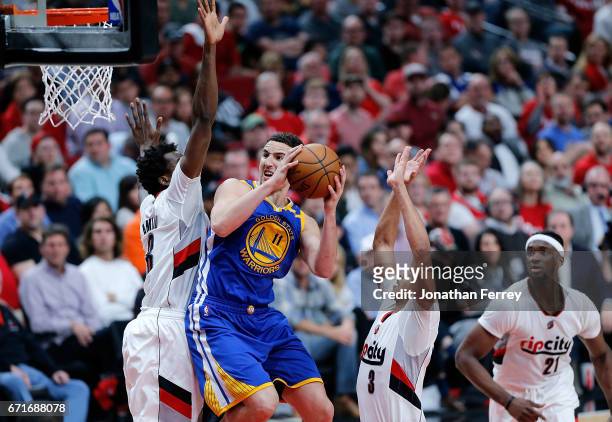 Klay Thompson of the Golden State Warriors shoots the ball over Al Farouq Aminu of the Portland Trail Blazers during Game Three of the Western...