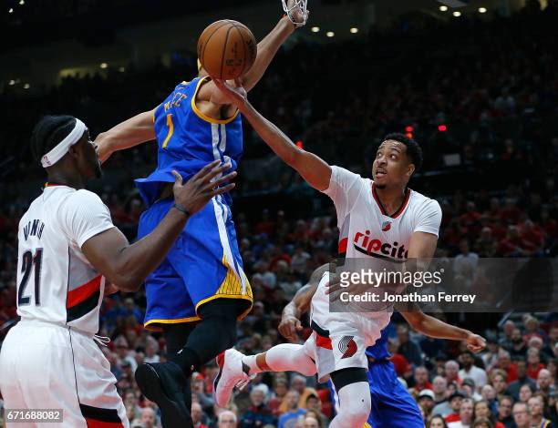 McCollum of the Portland Trail Blazers lays up the ball against the Golden State Warriors during Game Three of the Western Conference Quarterfinals...