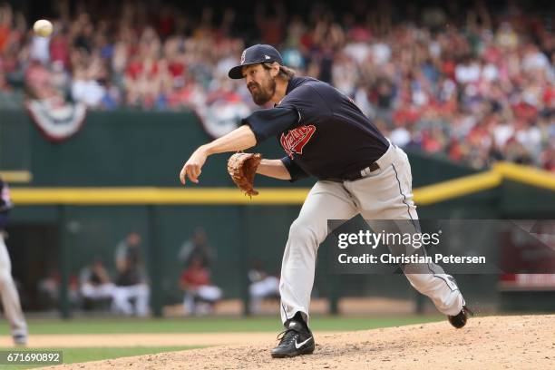 Relief pitcher Andrew Miller of the Cleveland Indians throws a warm up pitch during the MLB game against the Arizona Diamondbacks at Chase Field on...