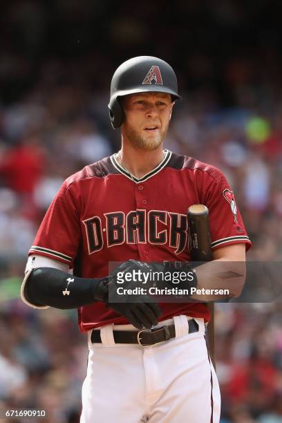 Jeremy Hazelbaker of the Arizona Diamondbacks adjusts his batting gloves during the MLB game against the Cleveland Indians at Chase Field on April 9,...