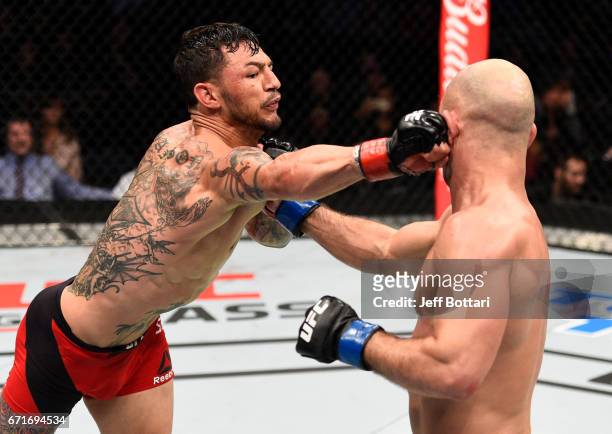 Cub Swanson punches Artem Lobov of Russia in their featherweight bout during the UFC Fight Night event at Bridgestone Arena on April 22, 2017 in...