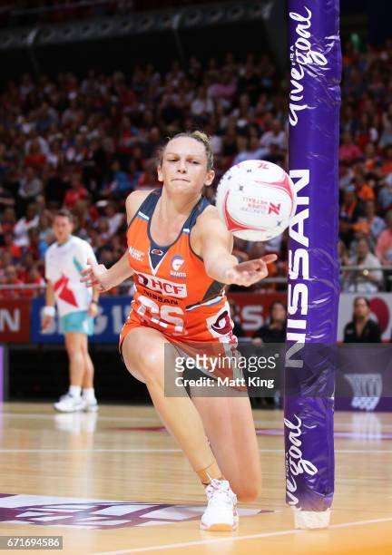 Jo Harten of the Giants reaches for the ball during the round nine Super Netball match between the Giants and the Magpies at Qudos Bank Arena on...