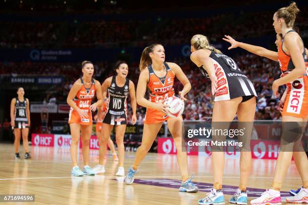 Susan Pettitt of the Giants controls the ball during the round nine Super Netball match between the Giants and the Magpies at Qudos Bank Arena on...