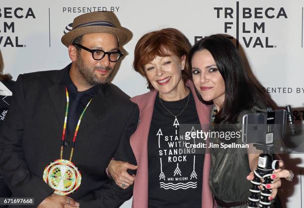 Director Josh Fox, actress Frances Fisher and TV personality Nomiki Konst attend "Awake: A Dream From Standing Rock" during the 2017 Tribeca Film...