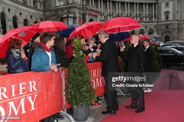 Friedrich von Thun gives autographs to fans during the ROMY award at Hofburg Vienna on April 22, 2017 in Vienna, Austria.