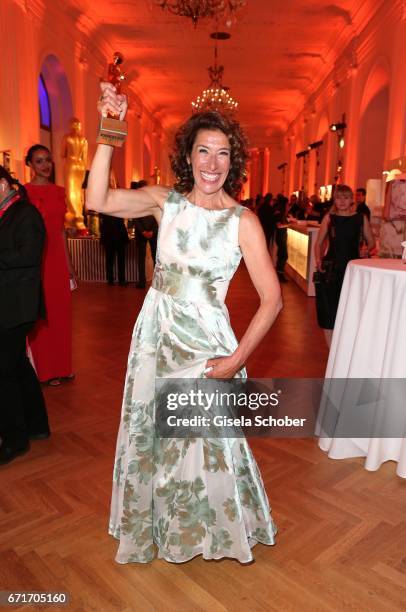 Adele Neuhauser with award during the ROMY award at Hofburg Vienna on April 22, 2017 in Vienna, Austria.