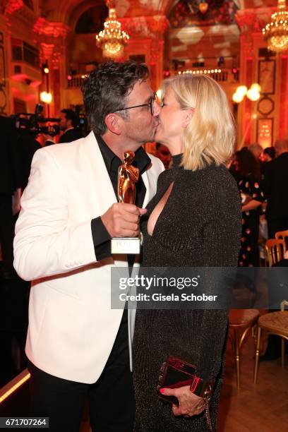 Hans Sigl and his wife Susanne Sigl with award during the ROMY award at Hofburg Vienna on April 22, 2017 in Vienna, Austria.