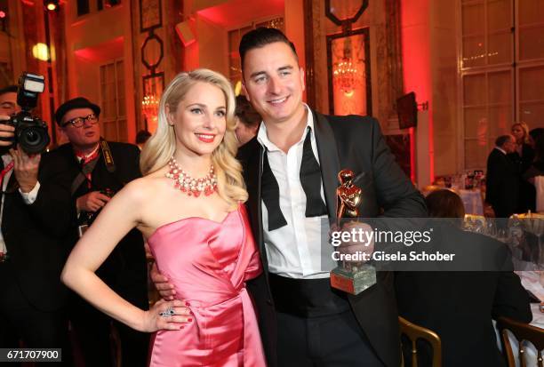 Andreas Gabalier and his girlfriend Silvia Schneider with award during the ROMY award at Hofburg Vienna on April 22, 2017 in Vienna, Austria.