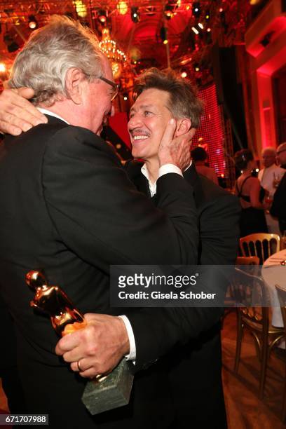 Friedrich von Thun congrats Tobias Moretti during the ROMY award at Hofburg Vienna on April 22, 2017 in Vienna, Austria.