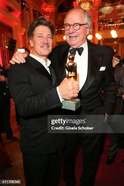 Friedrich von Thun congrats Tobias Moretti during the ROMY award at Hofburg Vienna on April 22, 2017 in Vienna, Austria.