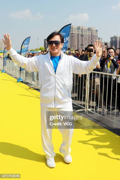 Actor Jackie Chan attends the start ceremony of 'You are my Green Heroes' Earth Day Run on April 22, 2017 in Shanghai, China.