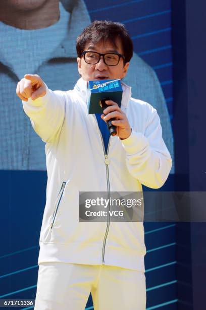 Actor Jackie Chan attends the start ceremony of 'You are my Green Heroes' Earth Day Run on April 22, 2017 in Shanghai, China.