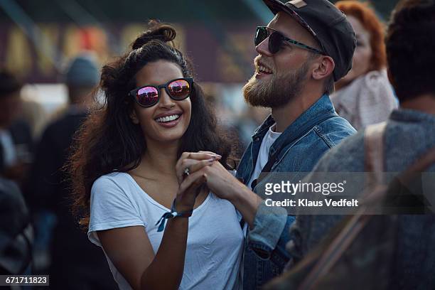 couple dancing at concert outside - couple concert stock pictures, royalty-free photos & images