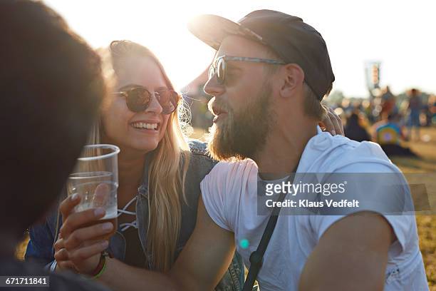 friends laughing at big festival concert - music festival 2016 weekend 2 stock pictures, royalty-free photos & images
