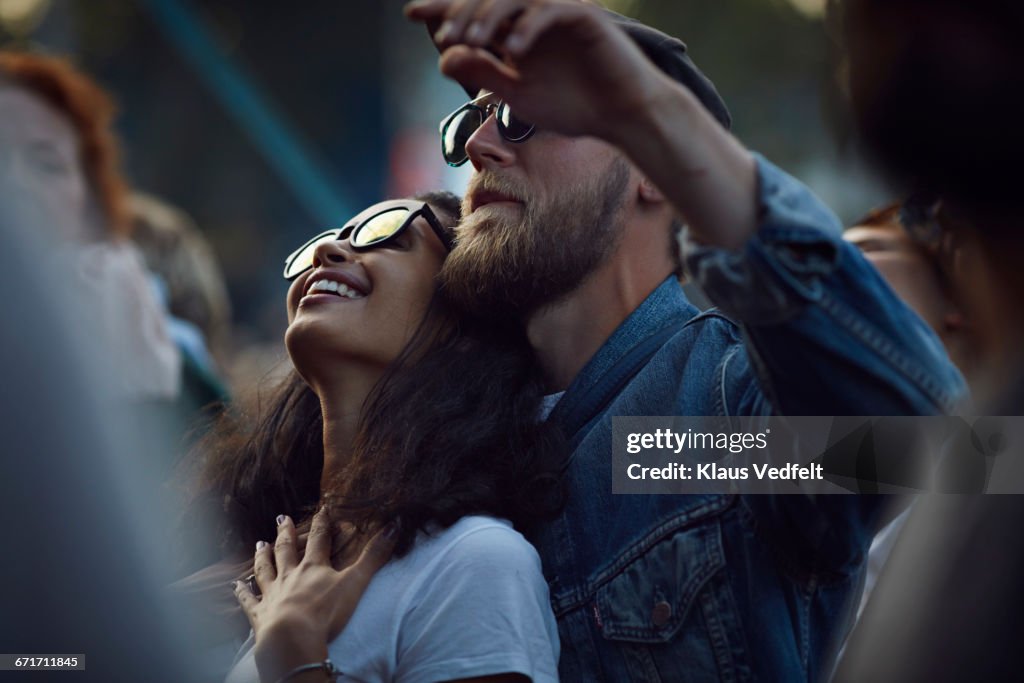 Couple together at romantic concert
