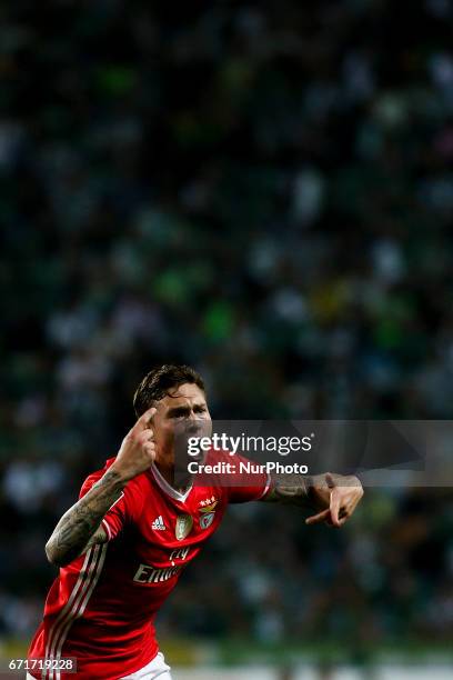 Benfica's Swedish defender Victor Lindelof celebrates after scoring a goal during the Portuguese League football match between Sporting CP and SL...