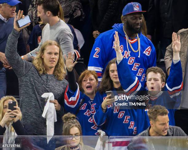 Noah Syndergaard, Susan Sarandon, Miles Robbins and Muhammad Wilkerson are seen at Madison Square Garden on April 22, 2017 in New York City.