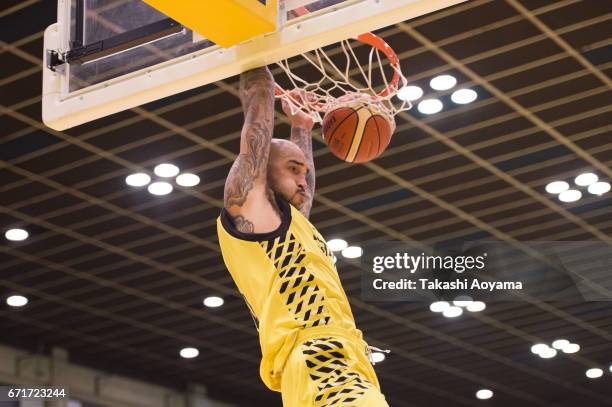 Robert Sacre of the SunRockers dunks during the B. League match between Hitachi SunRockers Tokyo-Shibuya and Toshiba Kawasaki Brave Thunders at...