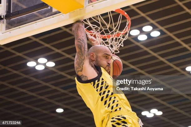 Robert Sacre of the SunRockers dunks during the B. League match between Hitachi SunRockers Tokyo-Shibuya and Toshiba Kawasaki Brave Thunders at...