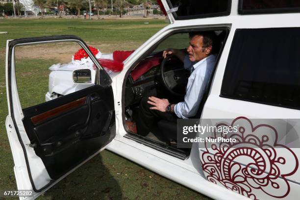 Palestinian mechanic Reviews his Cinderella car in Gaza City on 22 April 2017. It consists of five different cars, which will be rented for use in...