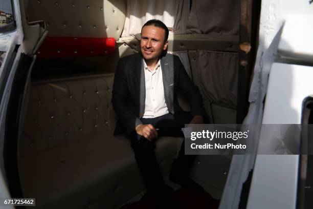 Palestinian mechanic Reviews his Cinderella car in Gaza City on 22 April 2017. It consists of five different cars, which will be rented for use in...