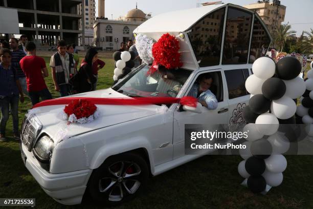 Palestinian mechanic Reviews his Cinderella car in Gaza City on 22 April 2017. It consists of five different cars, which will be rented for use in...