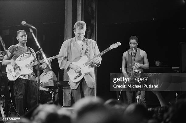 English singer-songwriter Sting and his band performing at the start of his first solo tour, at The Ritz Club, New York City, February 1985. Left to...