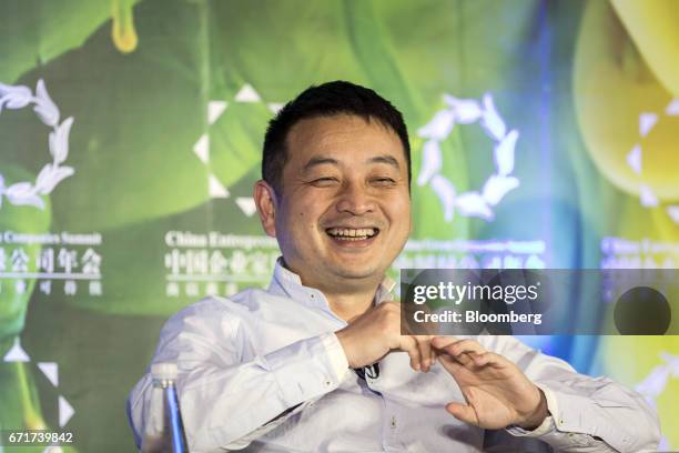 James Liang, co-founder and chairman Ctrip.com International Ltd., speaks during a session at the China Green Companies Summit in Zhengzhou, China,...