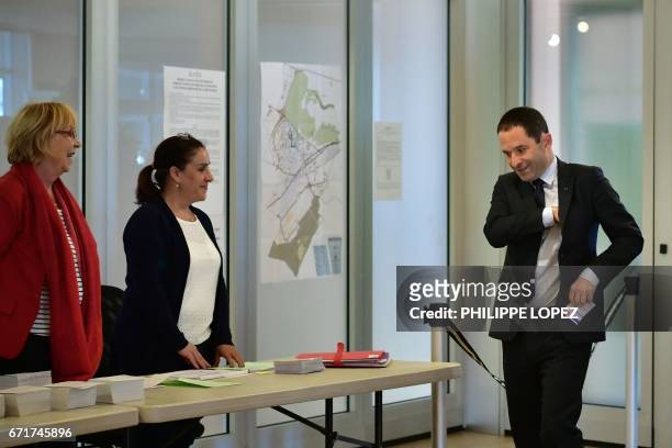 French presidential election candidate for the left-wing French Socialist party Benoit Hamon arrives at a polling station in Trappes, Paris' suburb,...