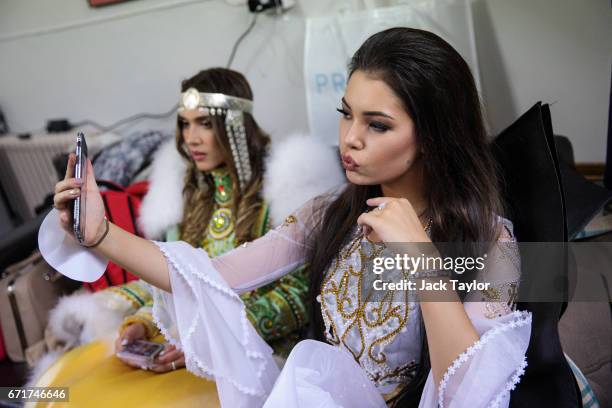 Contestants prepare backstage before the grand final of Miss USSR UK at the Troxy on April 22, 2017 in London, England. The annual beauty pageant...