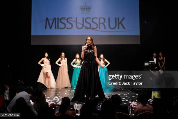 Contestant Anastasia Boil takes part in the 'Intellectual Contest' at the grand final of Miss USSR UK at the Troxy on April 22, 2017 in London,...