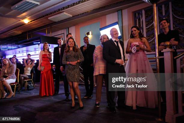 Members of the audience look on during the grand final of Miss USSR UK at the Troxy on April 22, 2017 in London, England. The annual beauty pageant...