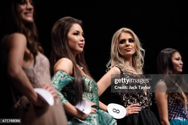Contestants line up during the 'Intellectual Contest' at the grand final of Miss USSR UK at the Troxy on April 22, 2017 in London, England. The...