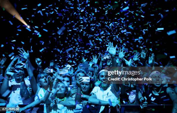 Lady Gaga fans watch her perform at the Coachella Stage during day 2 of the 2017 Coachella Valley Music & Arts Festival at the Empire Polo Club on...