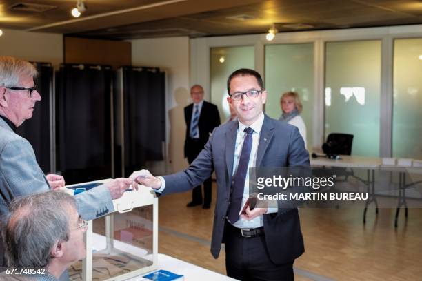 French presidential election candidate for the left-wing French Socialist party Benoit Hamon votes at a polling station in Trappes, Paris' suburb, on...