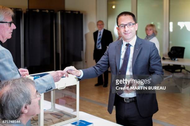 French presidential election candidate for the left-wing French Socialist party Benoit Hamon votes at a polling station in Trappes, Paris' suburb, on...