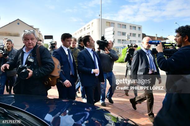 French presidential election candidate for the left-wing French Socialist party Benoit Hamon arrives at a polling station in Trappes, Paris' suburb,...