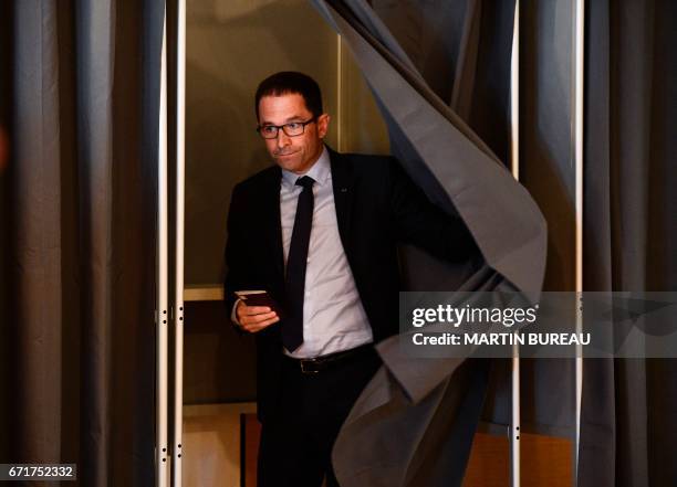 French presidential election candidate for the left-wing French Socialist party Benoit Hamon leaves a polling booth at a polling station in Trappes,...