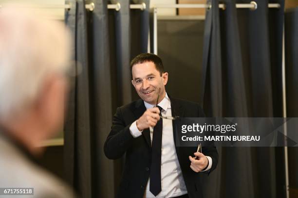 French presidential election candidate for the left-wing French Socialist party Benoit Hamon votes at a polling booth at a polling station in...