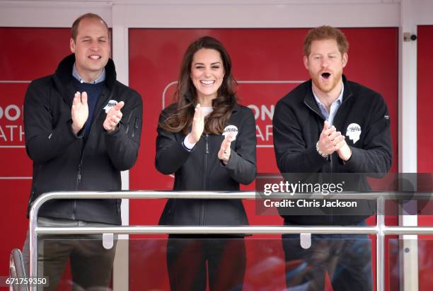 Prince William, Duke of Cambridge, Catherine, Duchess of Cambridge and Prince Harry cheer on runners as they signal the start of the 2017 Virgin...