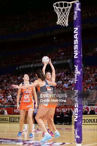 Caitlin Thwaites of the Magpies shoots during the round nine Super Netball match between the Giants and the Magpies at Qudos Bank Arena on April 23,...