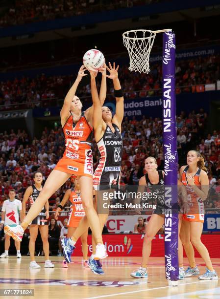 Jo Harten of the Giants competes with Sharni Layton of the Magpies during the round nine Super Netball match between the Giants and the Magpies at...