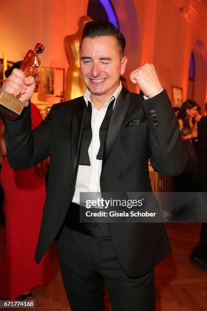 Singer Andreas Gabalier with award during the ROMY award at Hofburg Vienna on April 22, 2017 in Vienna, Austria.