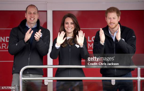 Prince William, Duke of Cambridge, Catherine, Duchess of Cambridge and Prince Harry cheer on runners as they signal the start of the 2017 Virgin...