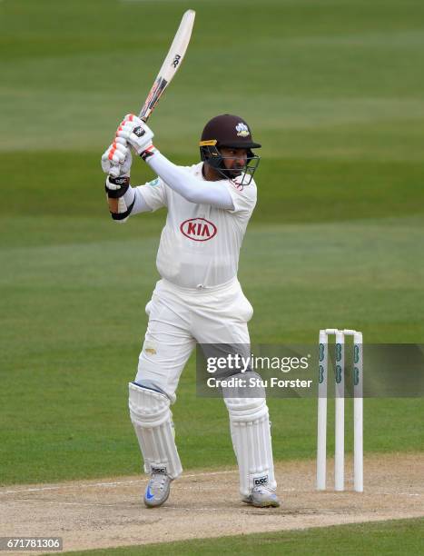 Surrey batsman Kumar Sangakkara in action during his century on day three of the Specsavers County Championship: Division One between Warwickshire...