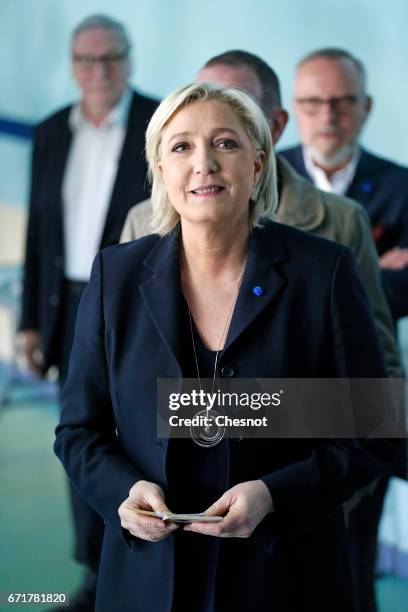 French far-right Front National party's President Marine Le Pen is waiting before she votes in the first round of 2017 French presidential election...