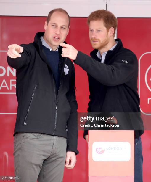 Prince William, Duke of Cambridge and Prince Harry speak ahead of signaling the start of the 2017 Virgin Money London Marathon on April 23, 2017 in...