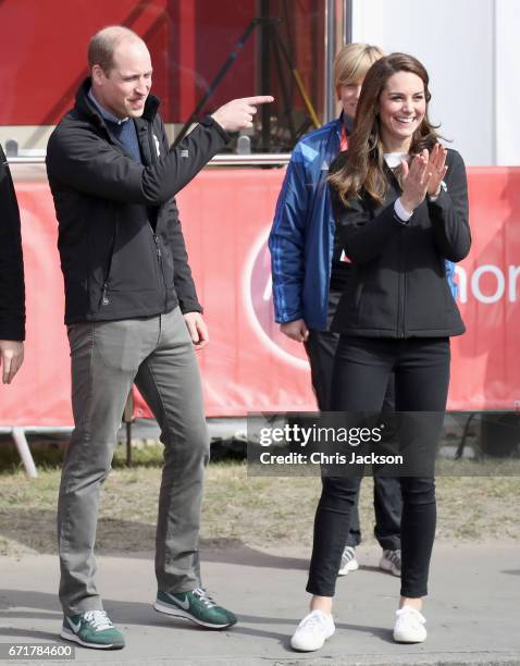 Prince William, Duke of Cambridge and Catherine, Duchess of Cambridge cheer on runners after they signaled the start of the 2017 Virgin Money London...