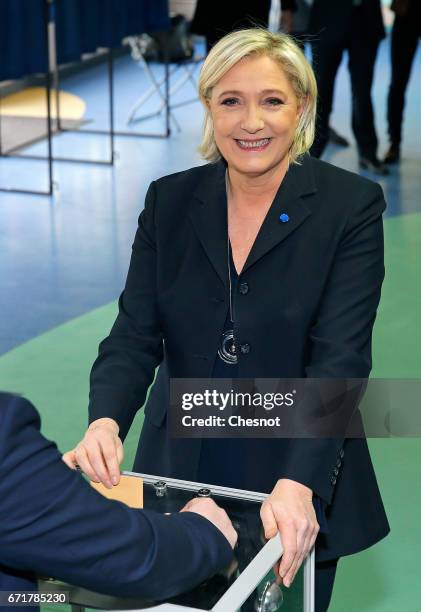 French far-right Front National party's President Marine Le Pen casts her vote for the French Presidential elections in a polling station on April...